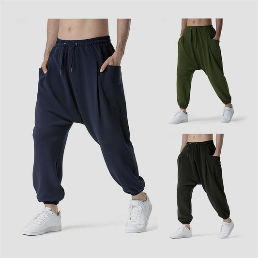 Pantalones deportivos holgados con bolsillo grande para hombre